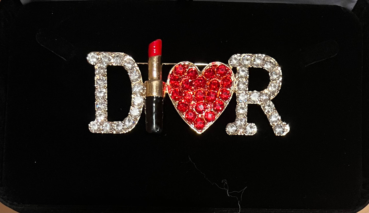 Rhinestone lipstick w/red heart.