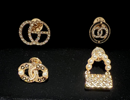 Gold tone metal purse 4 piece brooch pin set.