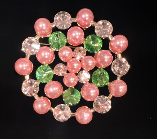 Pink and green pearl brooch.