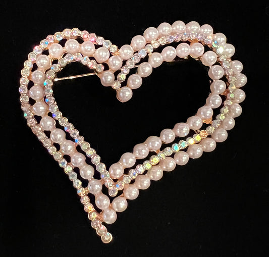 Gold tone heart brooch with pearls and tricolor rhinestones.