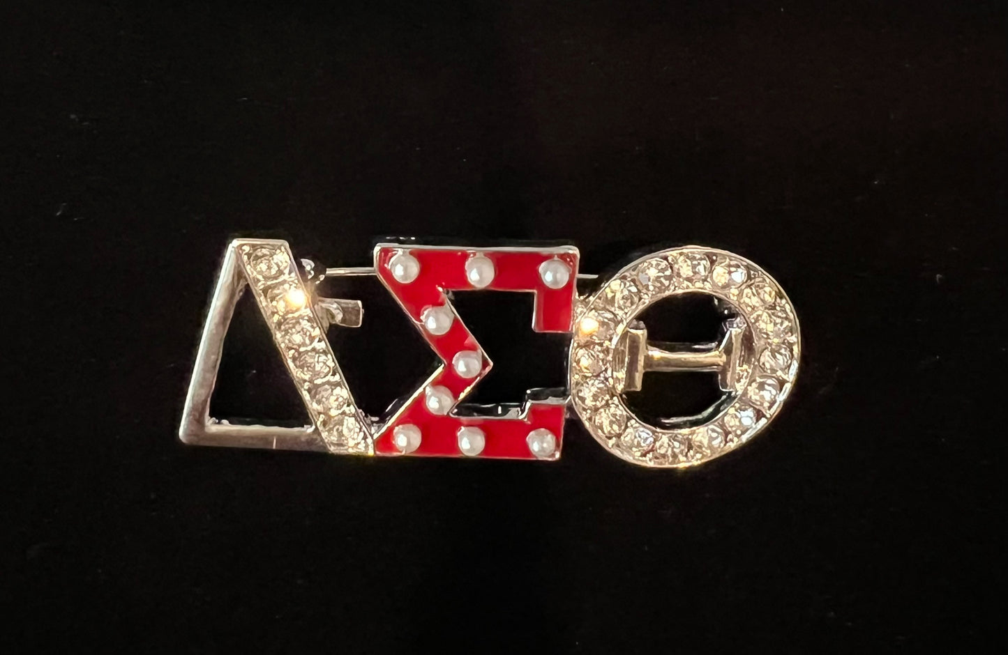 Delta Sigma Theta goldtone w/rhinestones.