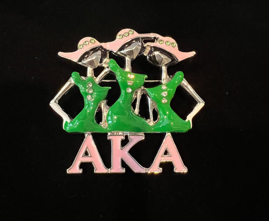 Alpha Kappa Alpha (AKA) 3 ladies w/hats and logo.