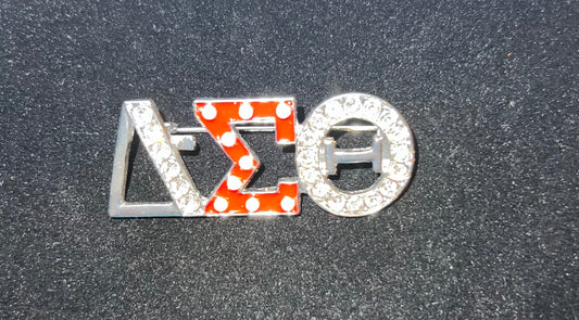 Delta Sigma Theta silvertone brooch W/rhinestones.